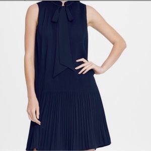 DKNY classic navy pleated dress with bow detail.